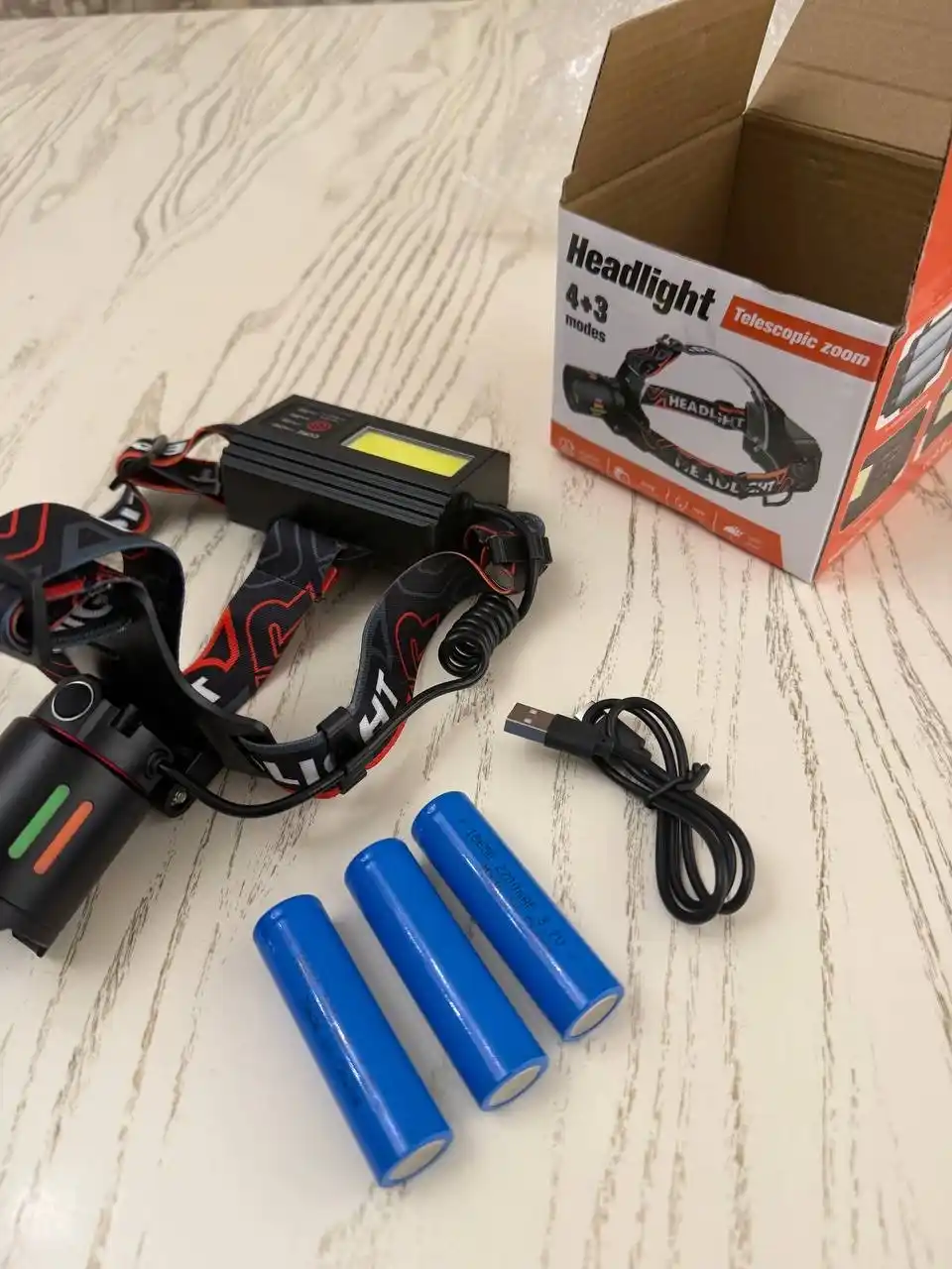 Powerbank funksiyali, orqa chiroqli boshga taqiladigan fonar, 7 ta rejim