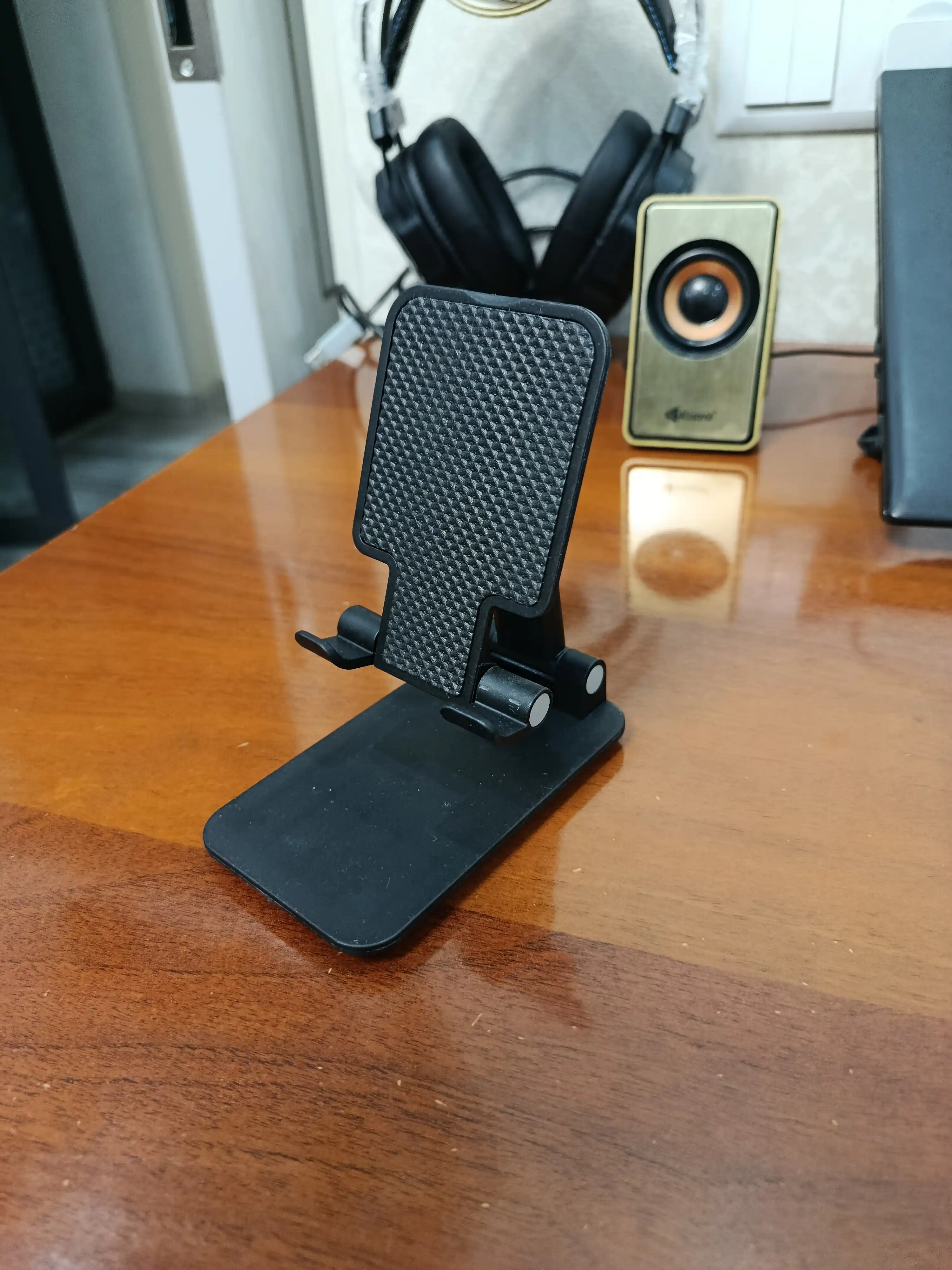 Telefon va planshet uchun sozlanadigan, buklanadigan taglik-ushlagich