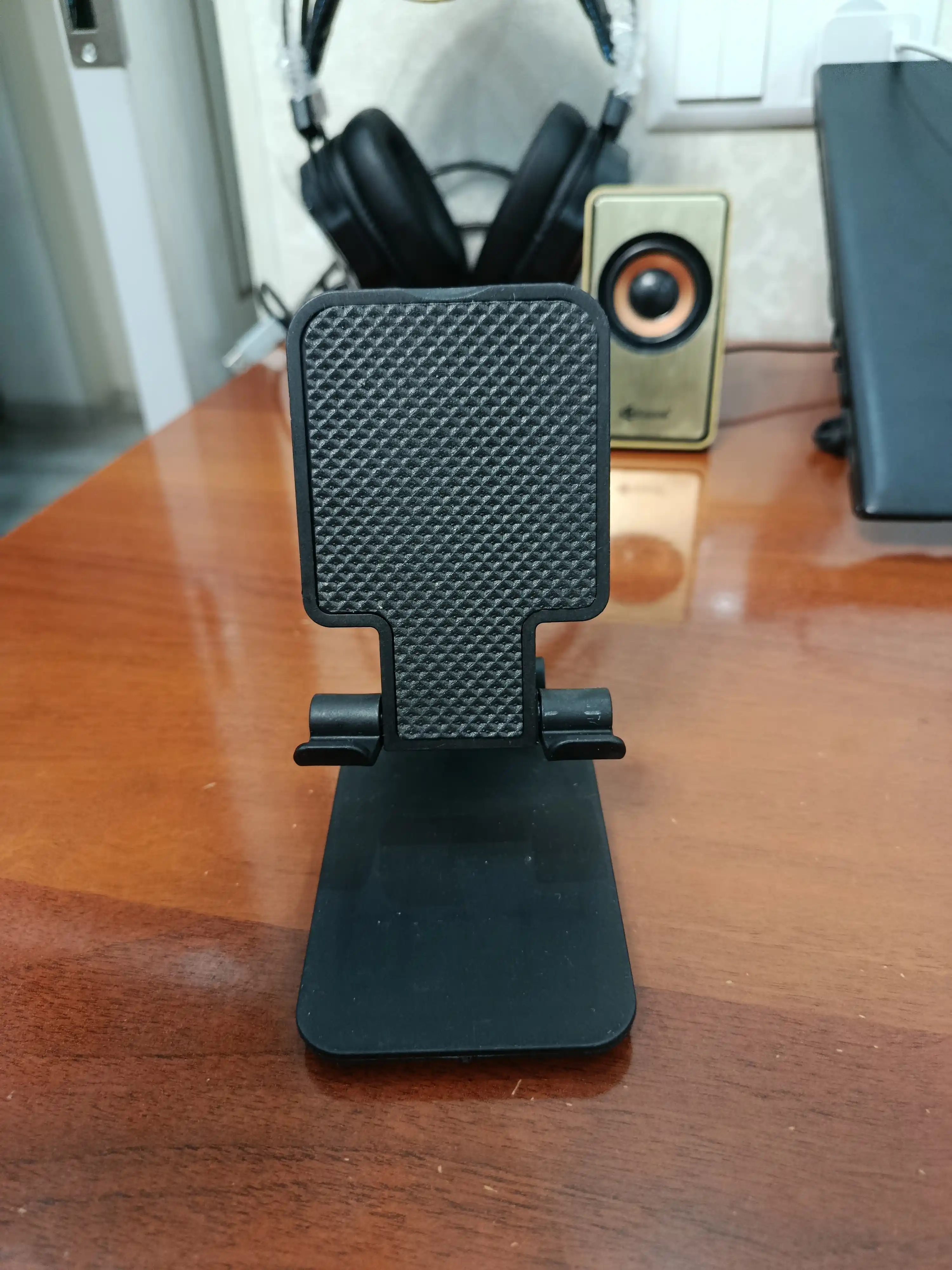 Telefon va planshet uchun sozlanadigan, buklanadigan taglik-ushlagich