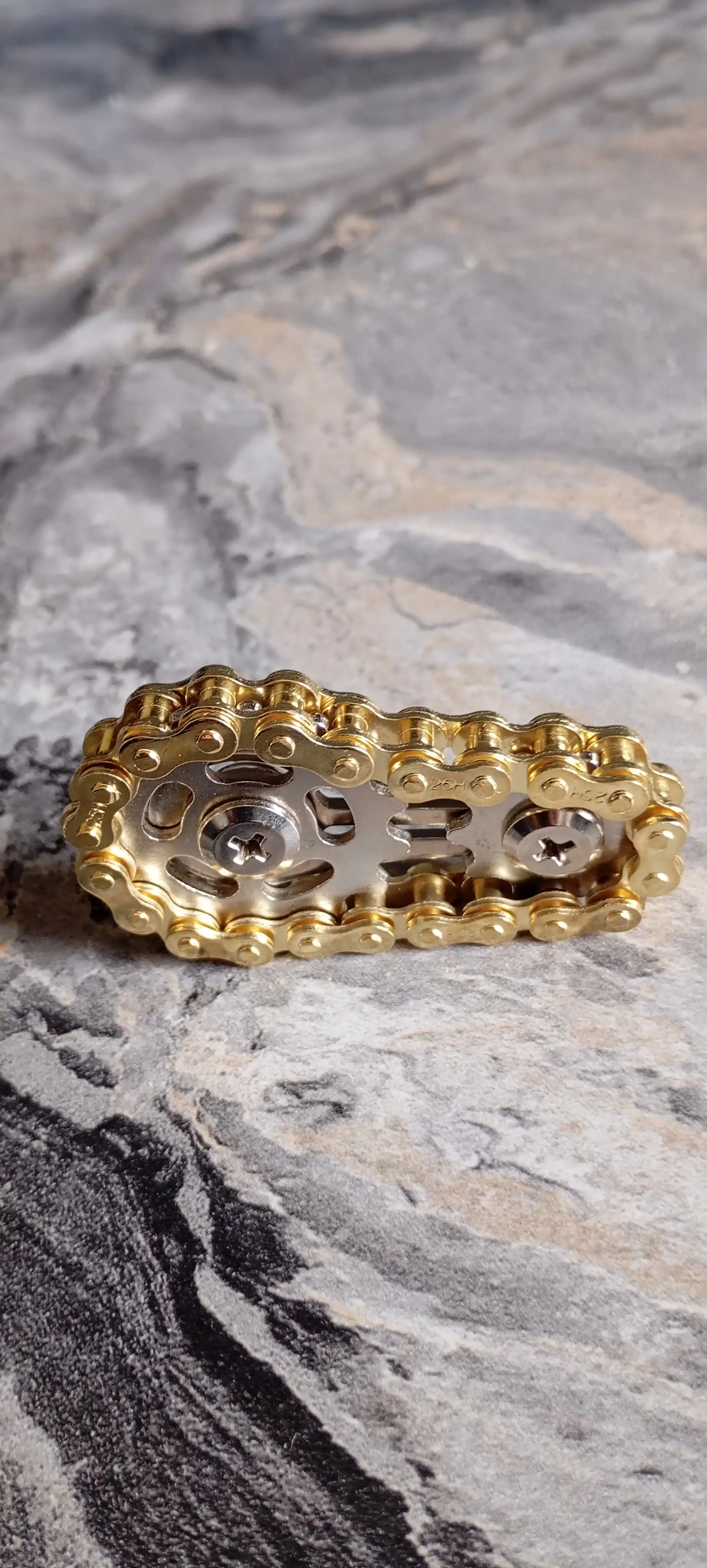 Metall antistress spinner zanjirli va tishli, qo‘l uchun dumaloq fidjet spinner