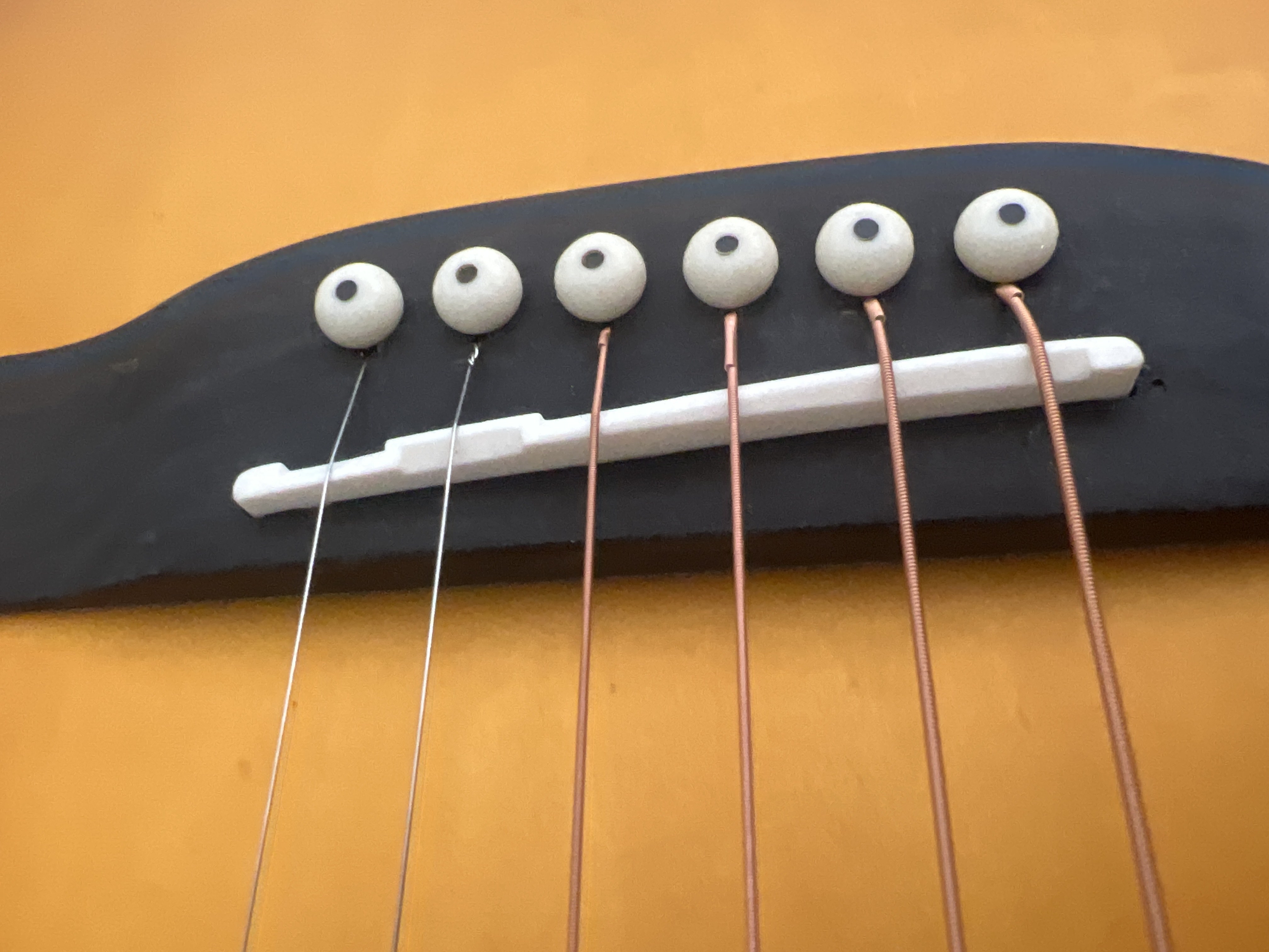 Akustik gitara uchun suyakli porojek va sedlo