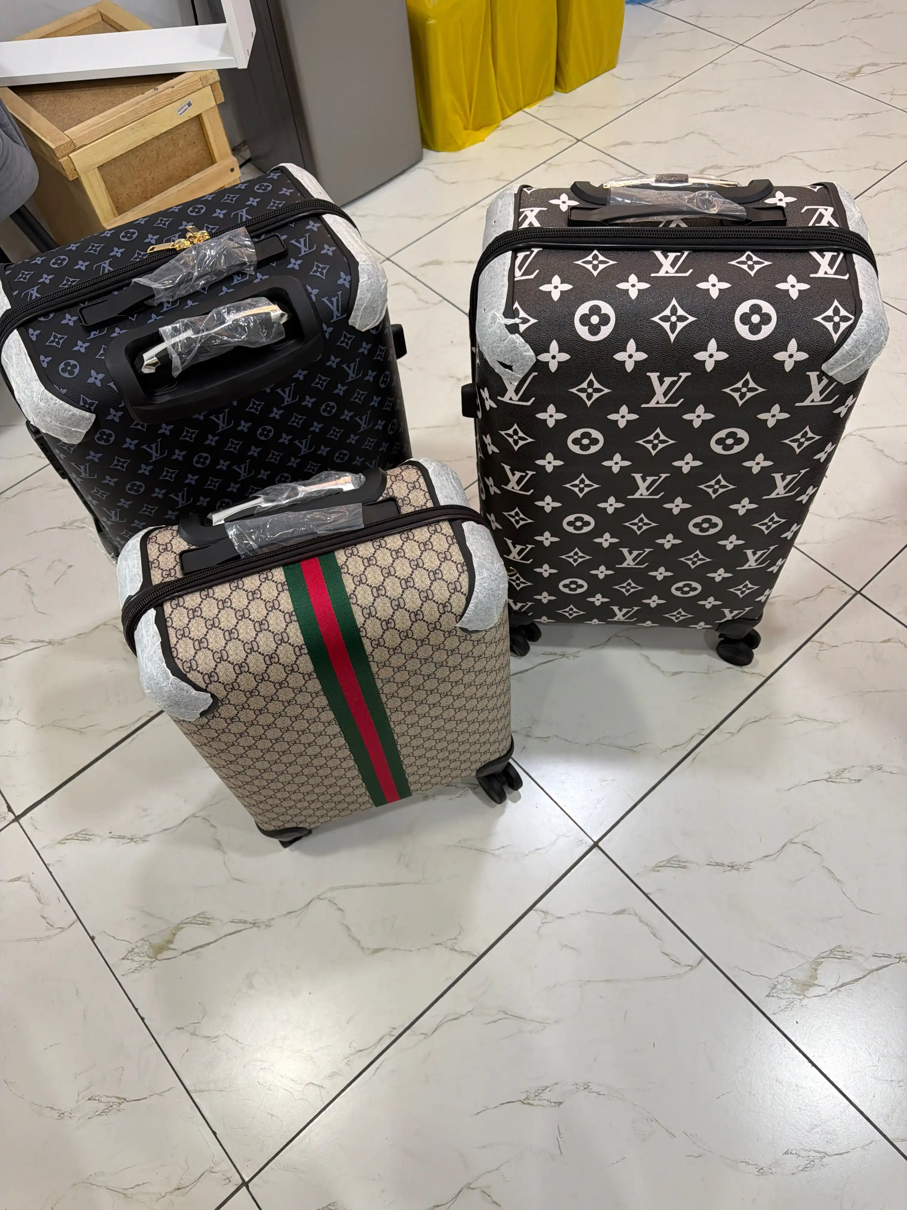 Chamadon g'ildirakli LV yo'l sayohat sumkasi molniyali