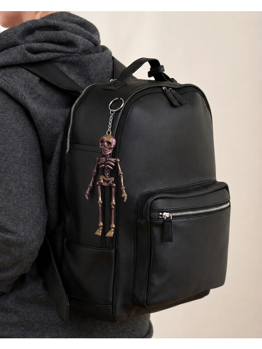 Ko‘p rangli harakatlanuvchi skelet figurasi, rang-barang dekorativ o‘yinchoq