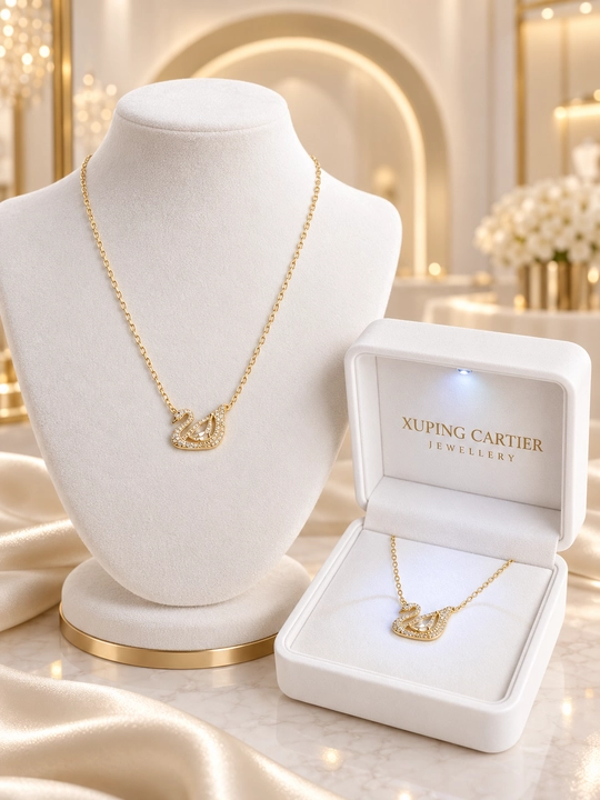 Ayollar zanjiri - oqqush shaklidagi marjon, SWAROVSKI kristallari bilan bezatilgan