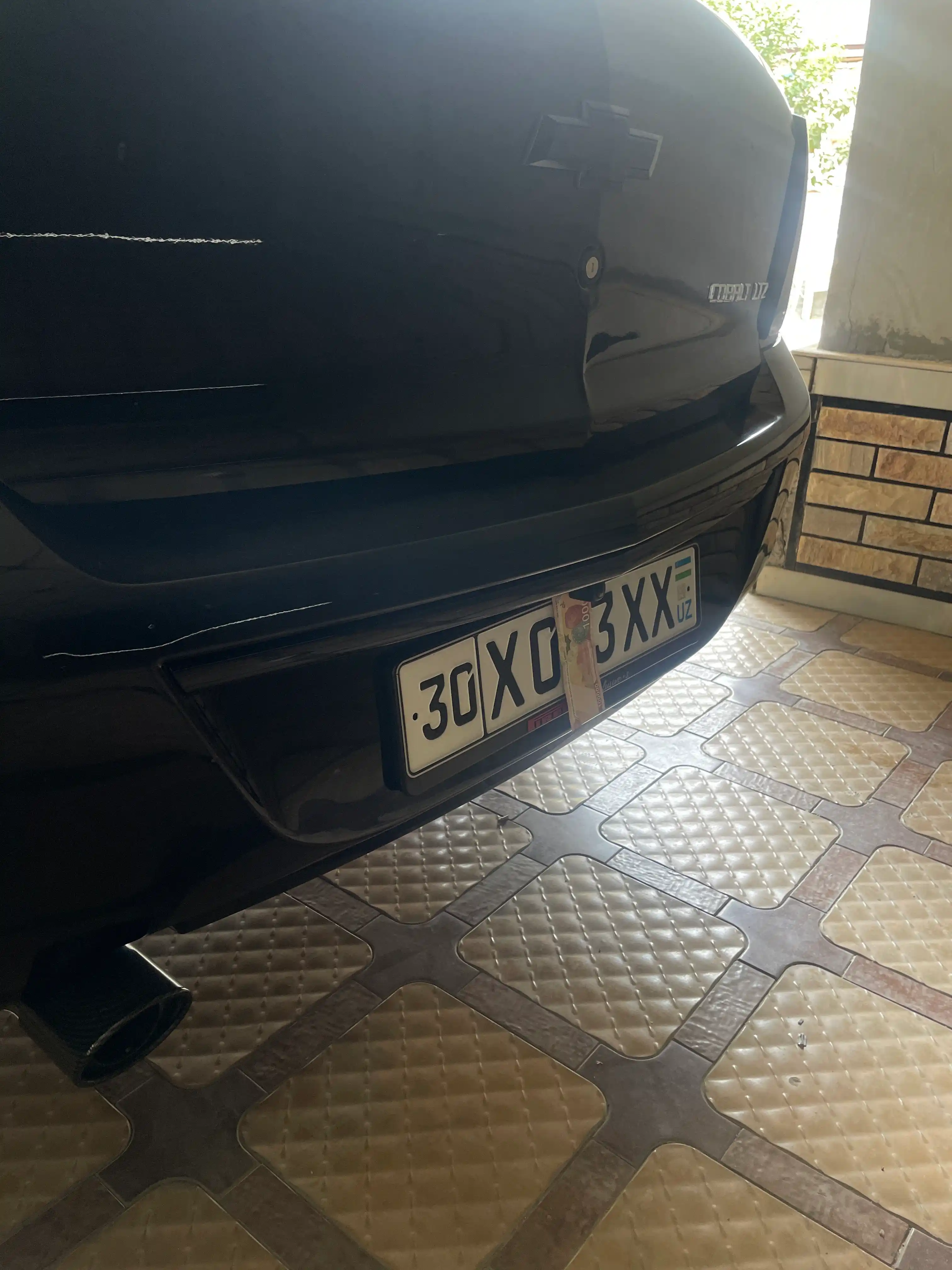 Накладка на задний бампер Chevrolet Cobalt черный глянец (Black Piano)