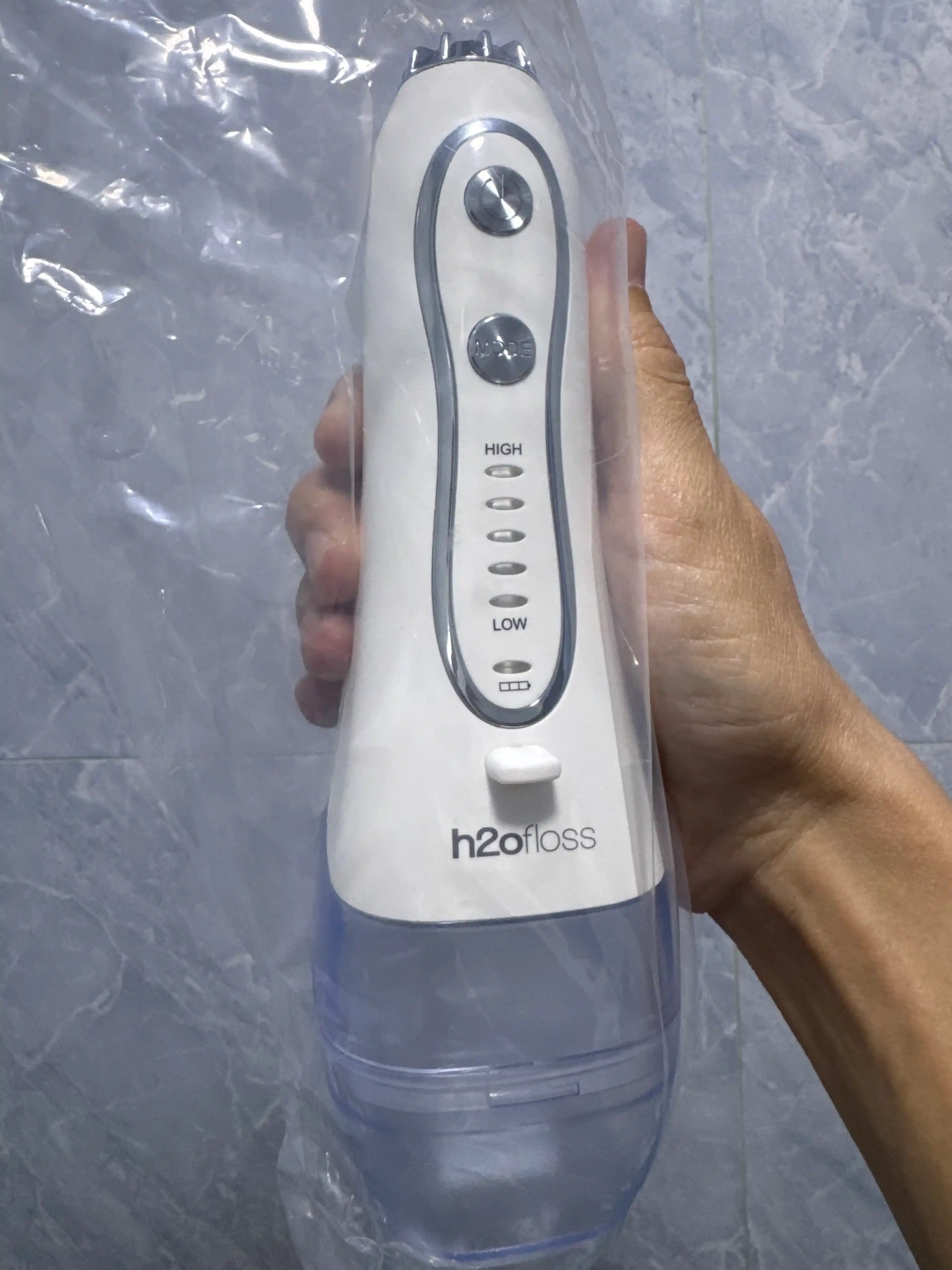 Tishlar uchun H2ofloss og‘iz bo‘shlig‘i uchun portativ irrigator