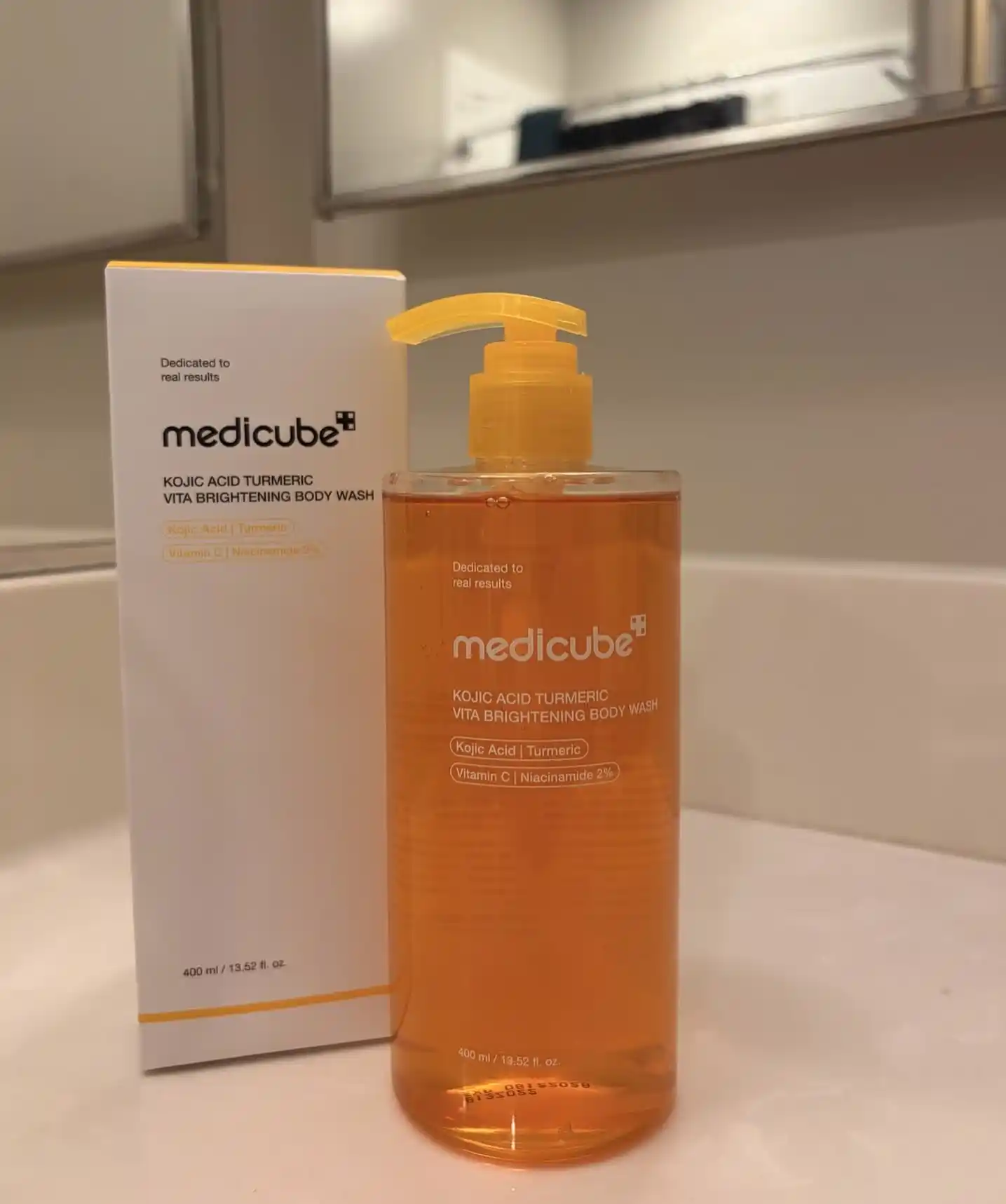 Medicube Kojic Acid — Oqartiruvchi dush geli, kojik kislotasi va zarchava bilan