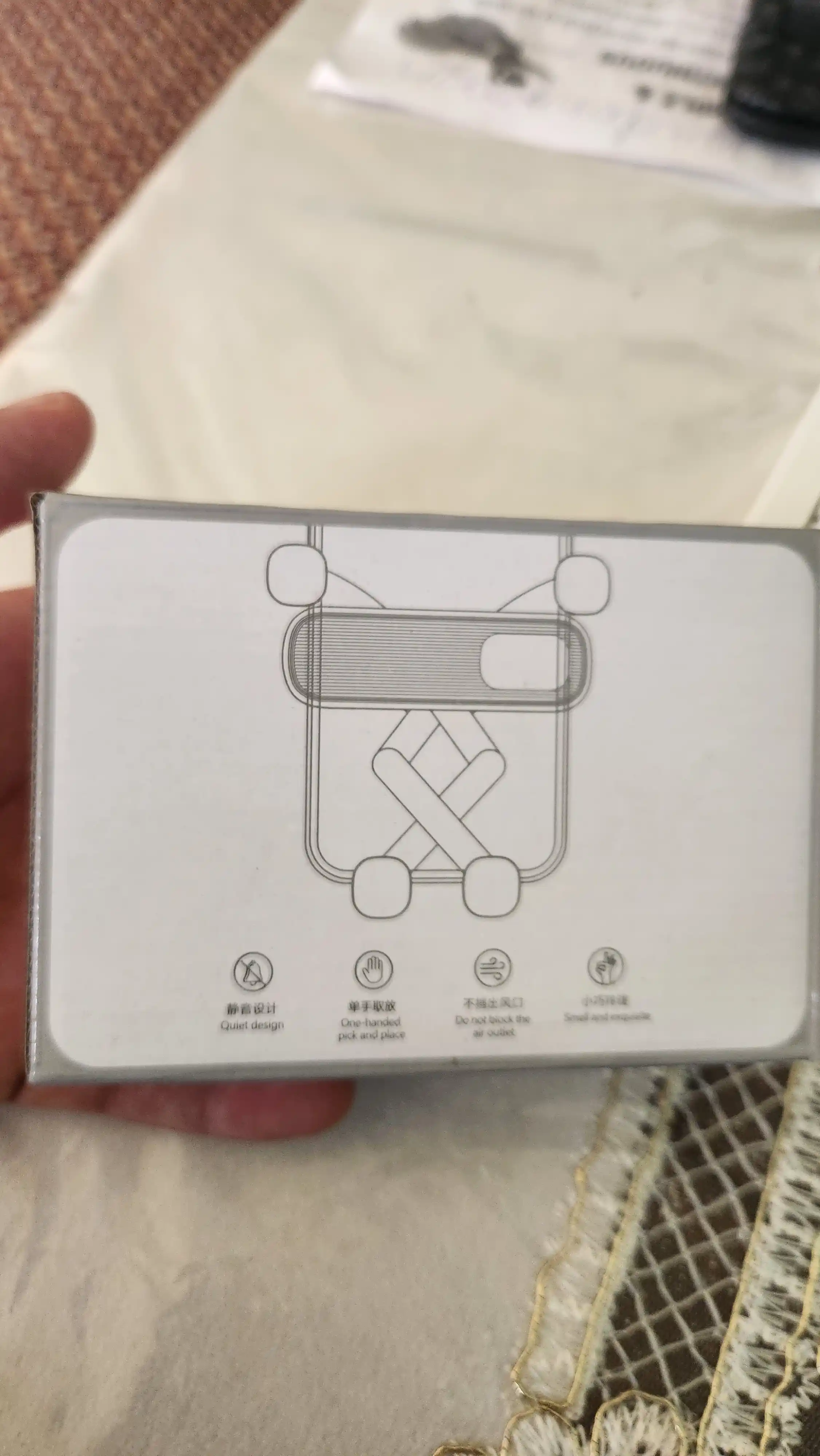 Avtomobil uchun ixcham telefon ushlagichi – ventilyatsiya panjarasiga o‘rnatiladi
