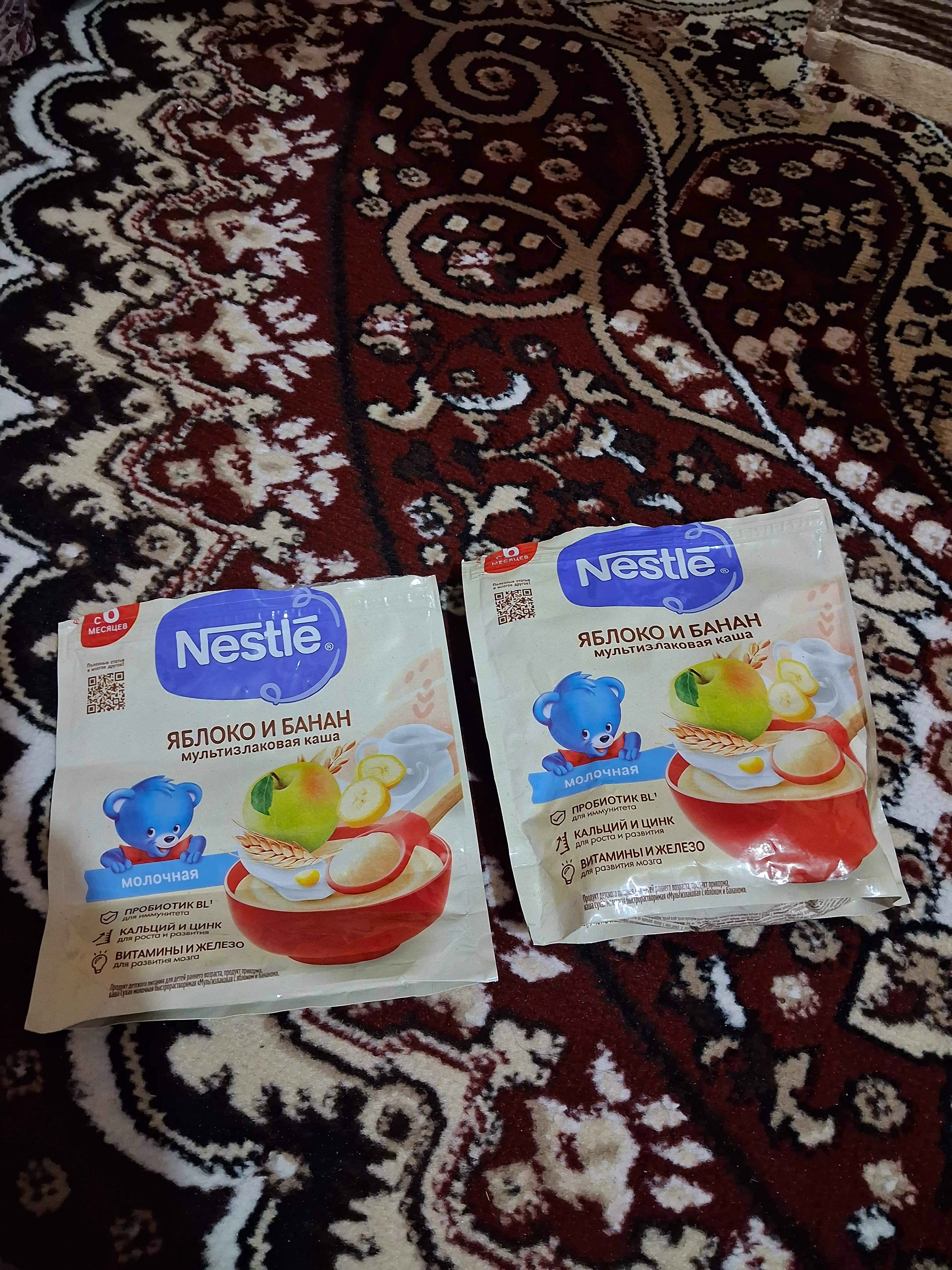 Nestle 6 oylik tez eriydigan "Olma-bananli multiflok" quruq sutli bo‘tqasi. 200g