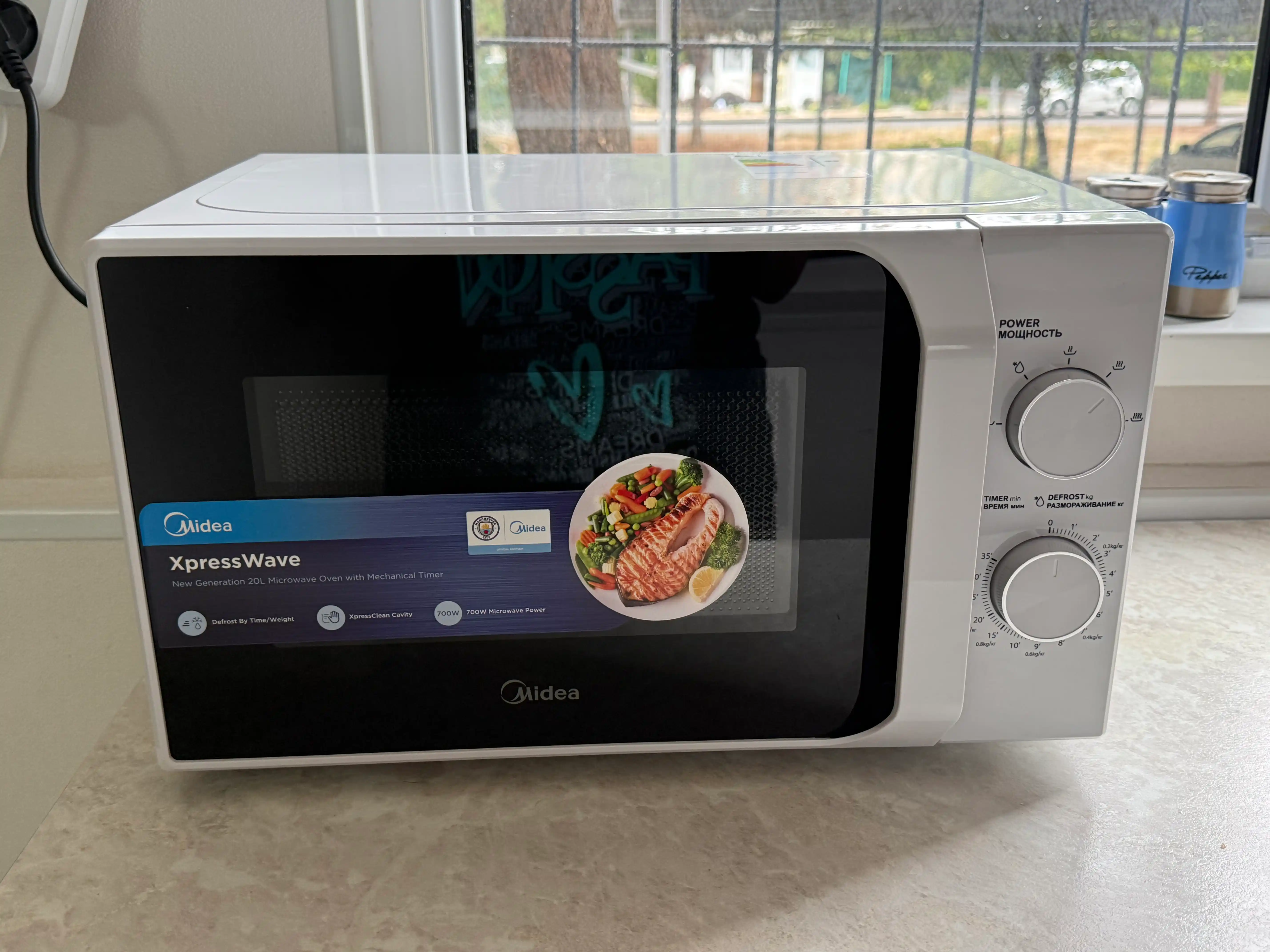 Midea MM 720C2MV Mikroto'lqinli pech, 8 ta dastur, bug' bilan tozalash tizimi