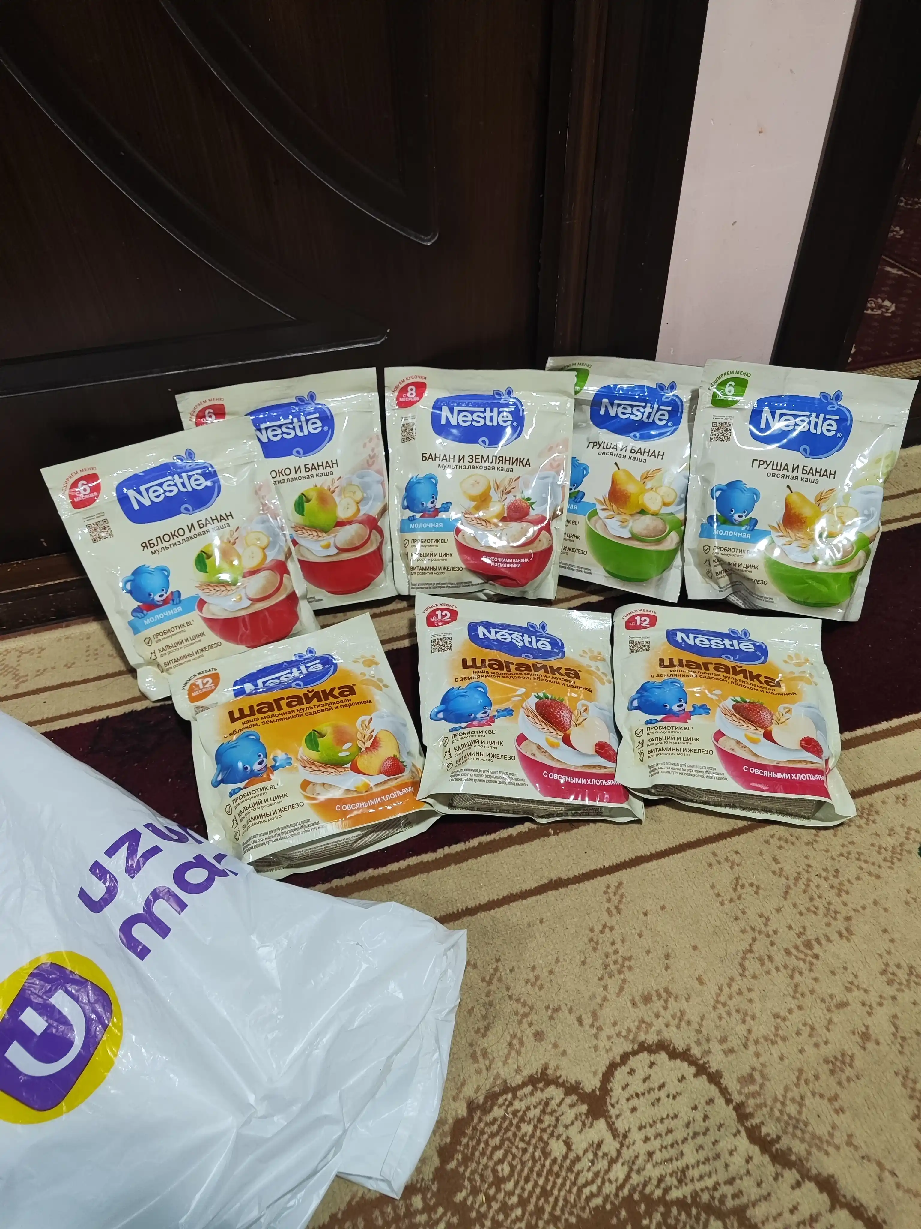 Nestle sutli tez eriydigan bo‘tqasi Banan va 8 oylik qulupnay bilan ko‘p donli 200g