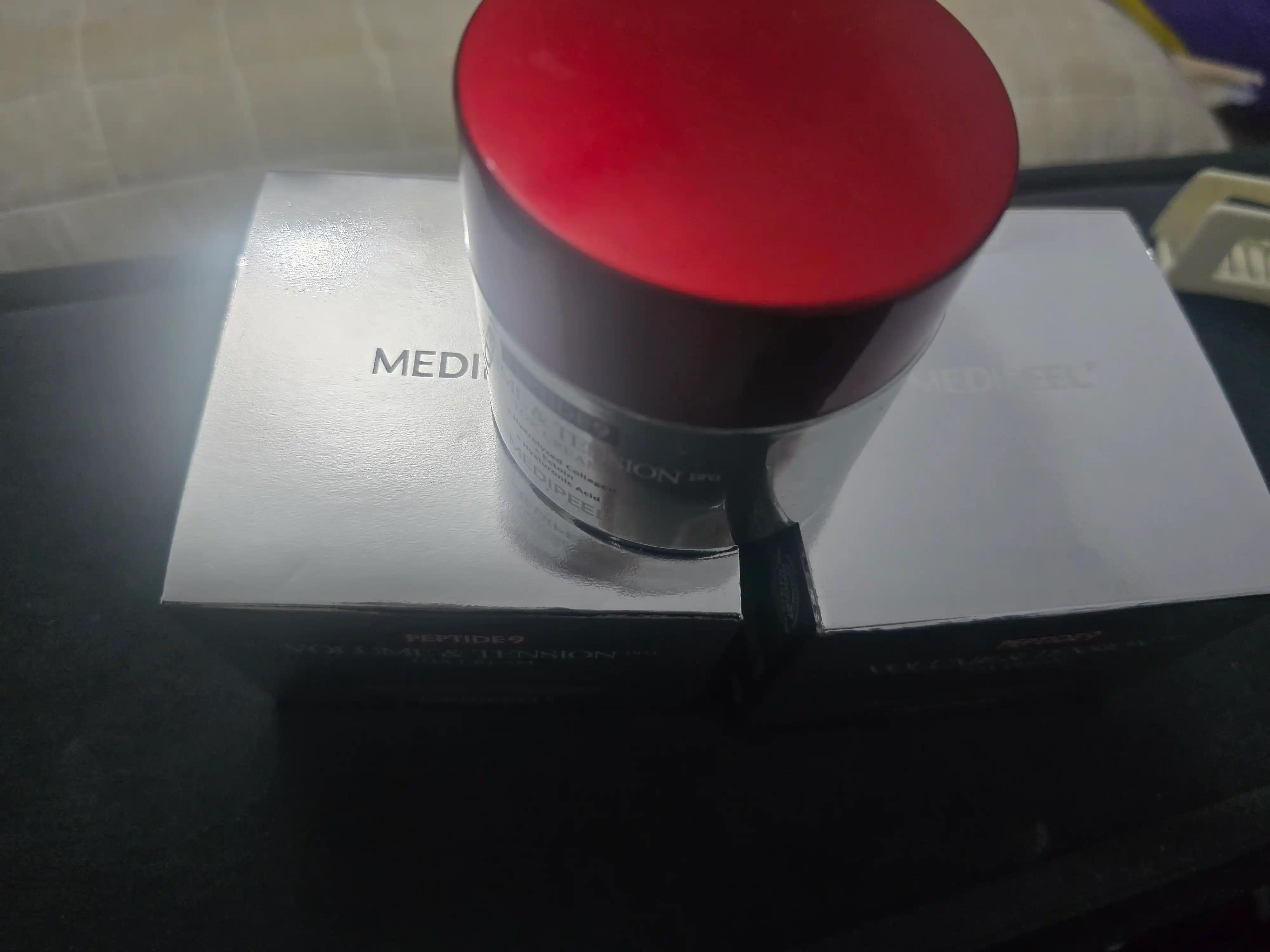 Peptidli qarishga qarshi lifting-kremi Medi-Peel Peptide 9 Volume & Tension Tox Cream PRO