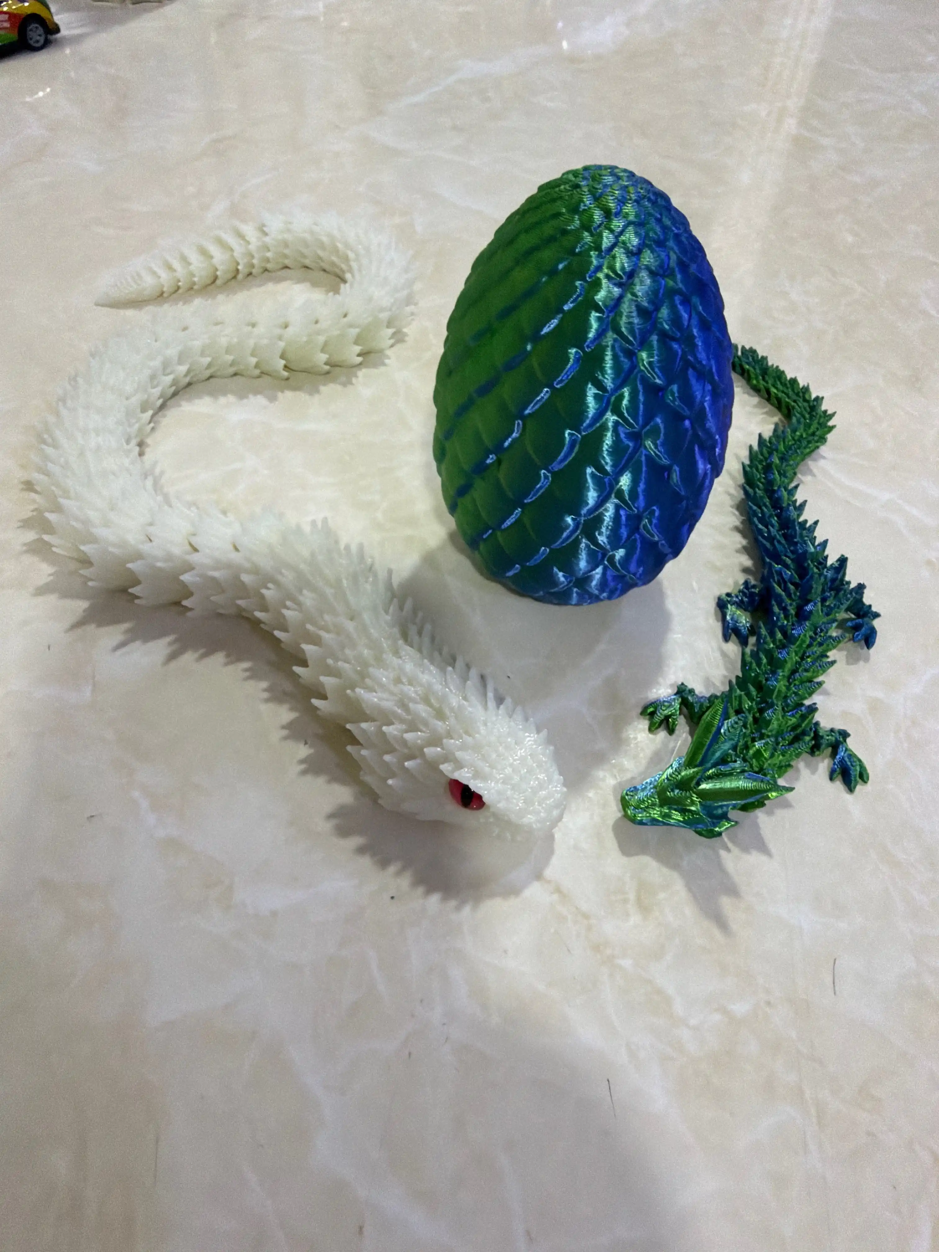 Креативная игрушка — дракон и змея, напечатанные на 3D-принтере