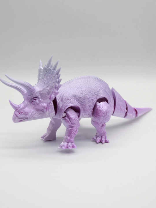 "Triseratops" 3D stressga qarshi o‘yinchoq, harakatlanuvchi dinozavr haykalchasi, bolalarga sovg‘a