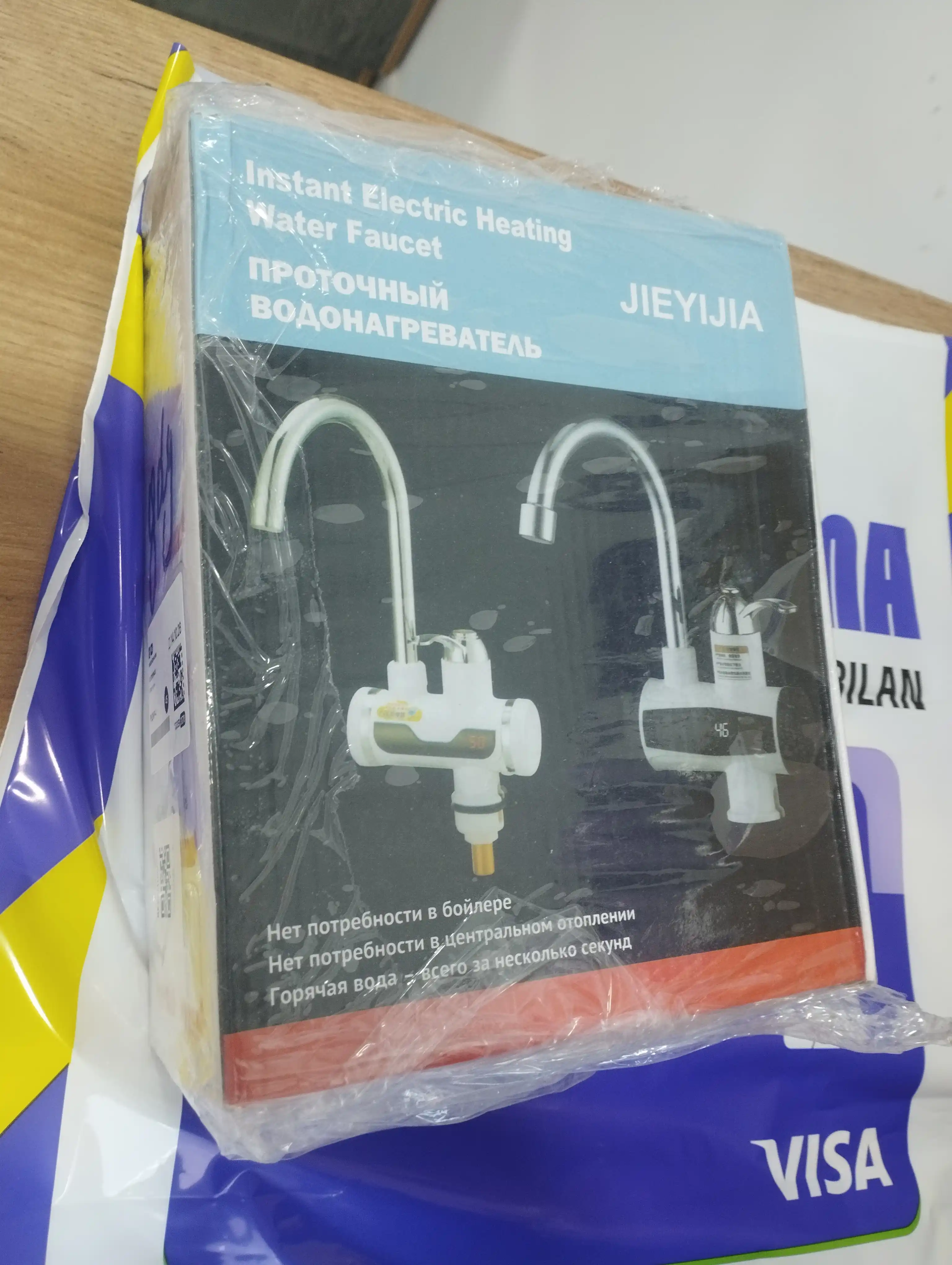Suvni bir zumda isitish uchun elektr suv isitish jo‘mragi