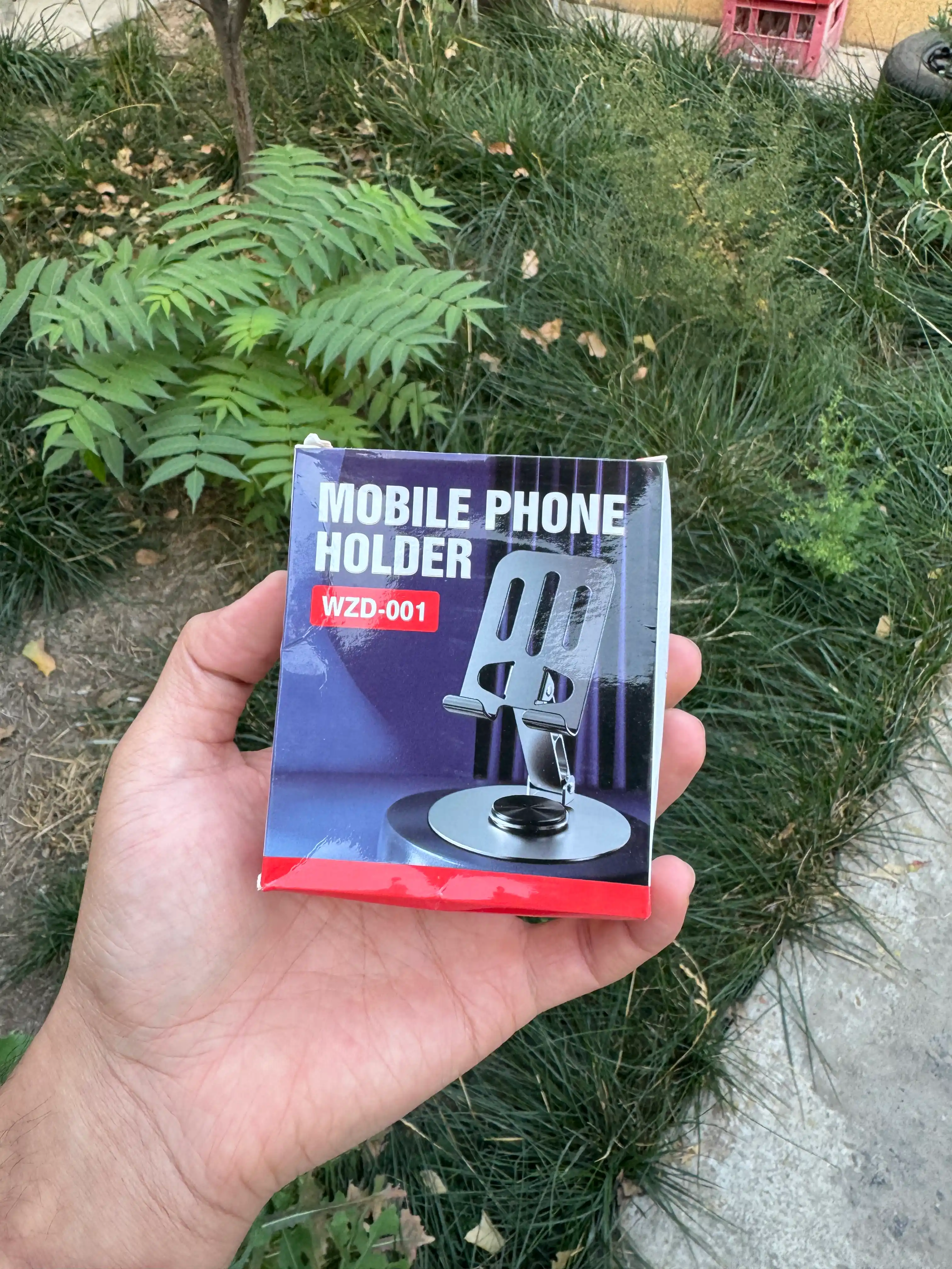 Telefon va planshet uchun rostlanadigan, buklanadigan tutqich